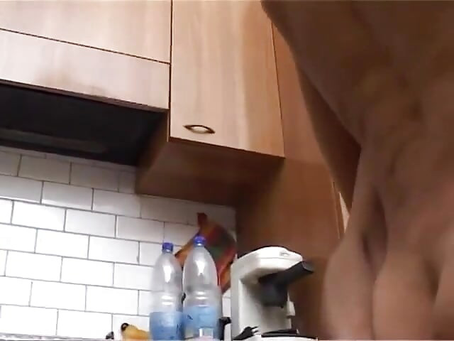 Lustful brunette gets banged in the kitchen by a young pig