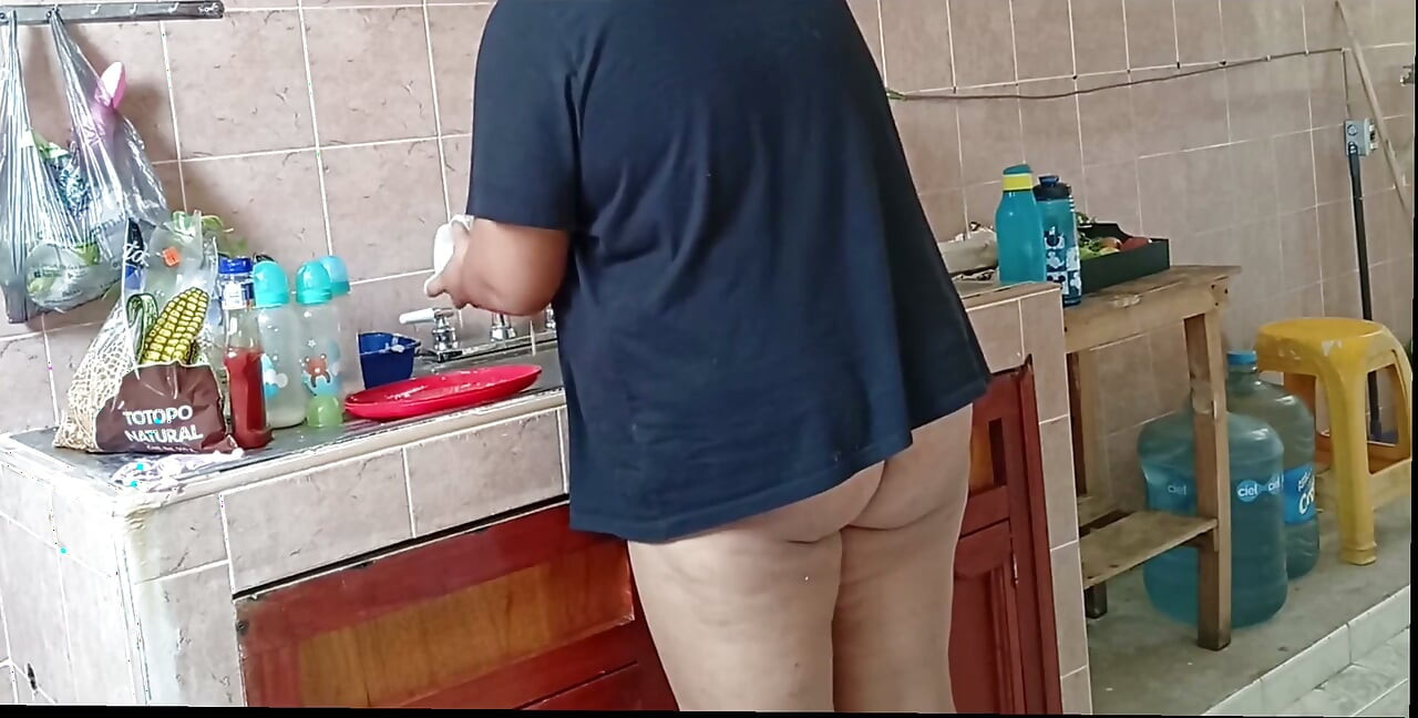 Chubby Stepmother Washes and Cleans the Kitchen