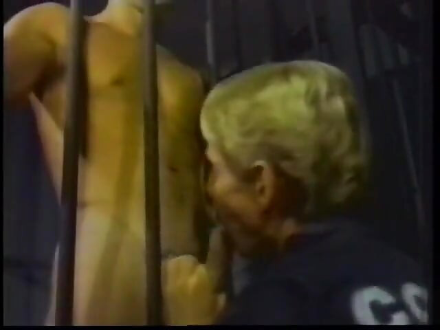Muscular policeman fucks prisoner in his ass