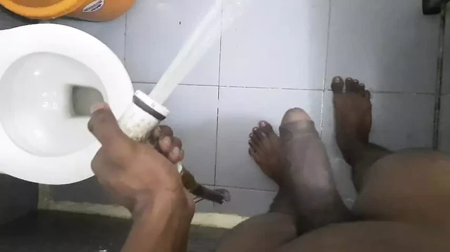 Hot boy masterbating in the bathroom during washing clothes