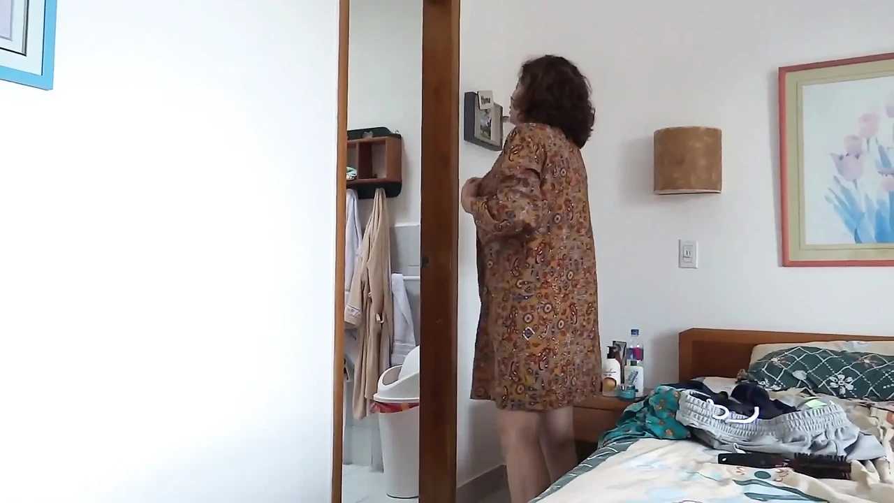 The owner of the hotel records me while I put on sunscreen to go to the beach and show off