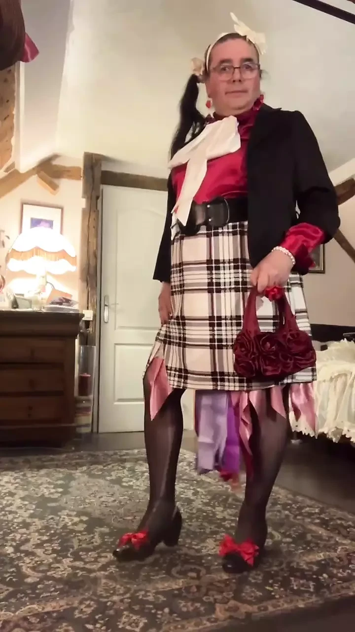 In secretary-style outfit with a short plaid skirt for a night out