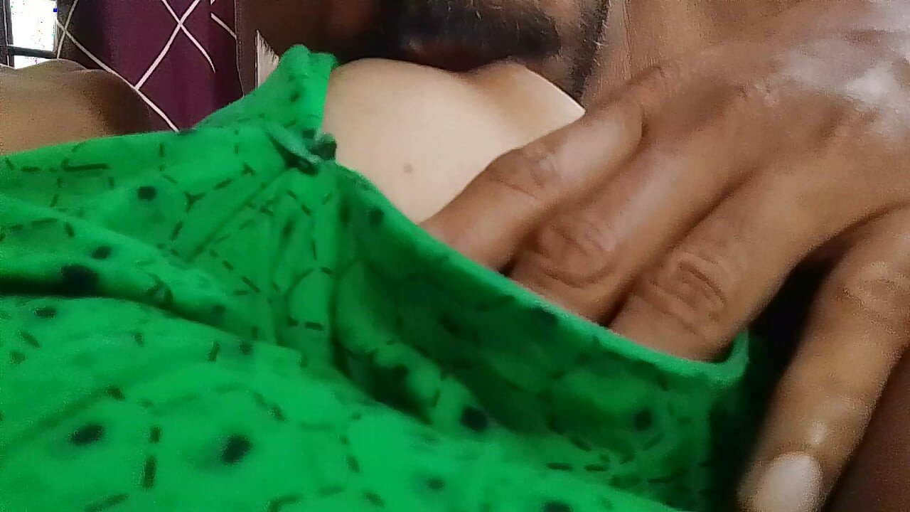 Her husband is sucking the Indian Malayali girl's breasts.