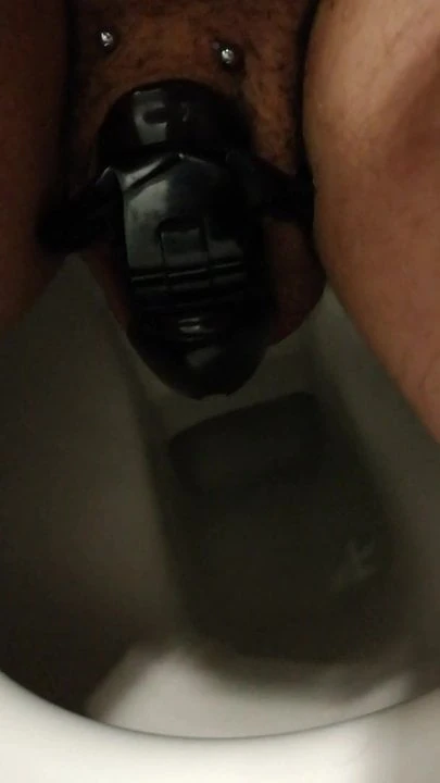 Peeing in Holy Trainer Chastity Cage