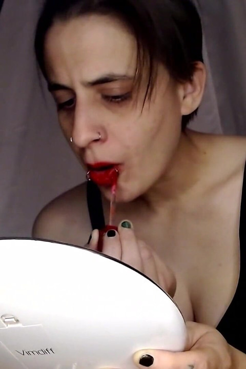 Thick Red Lipstick Application