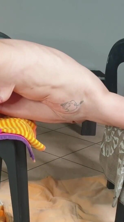Key moment from "Petite SLUT strip show pissing while doing a split"