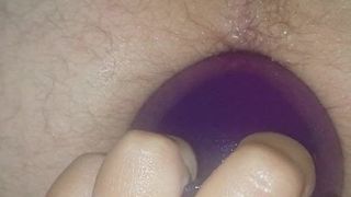 Hubby getting our big anal plug shoved in for the 1st time