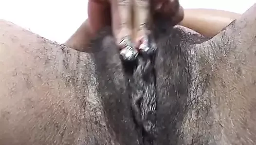 Black girl fingers her box while waiting for cock