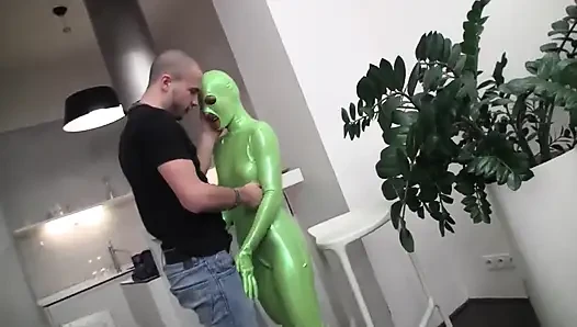 Crazy bitch in latex green costume takes a big hard cock!