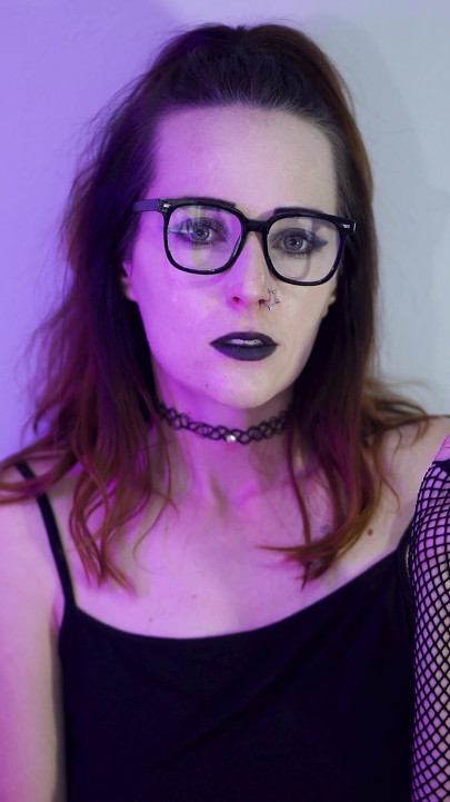 Goth Girl Smoking in Fishnets