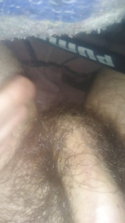 Man grops his cock under the covers