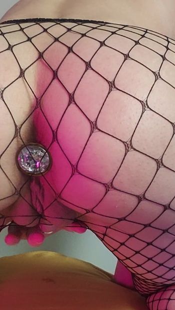 Playing with my buttplug in fishnets