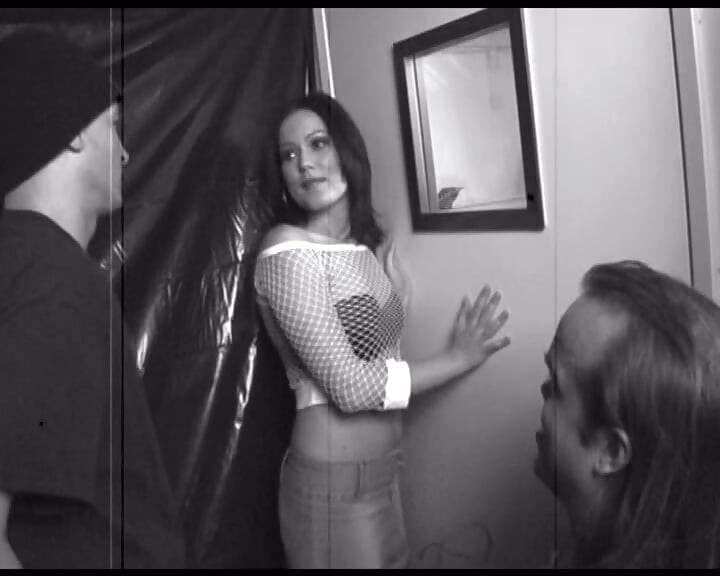 Seductive Brunette in Fishnet Sucks Cock and Licks Pussy Backstage