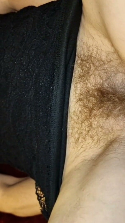 The juice begins to pour out of her hairy pussy | Clip 1