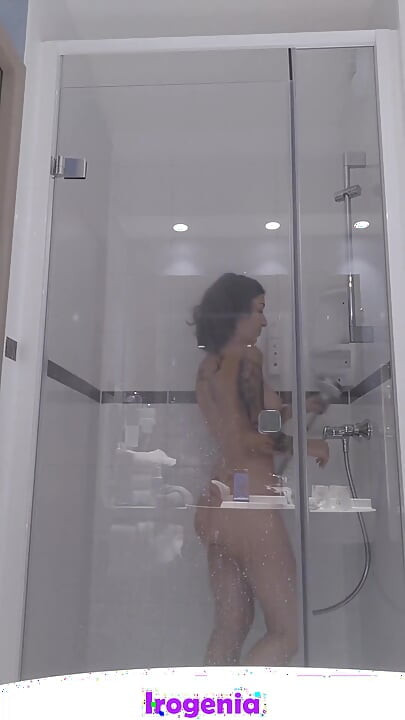 A Slut Dildos Herself During Her Shower, Comes to Watch on Her Through the Transparent Glass Window