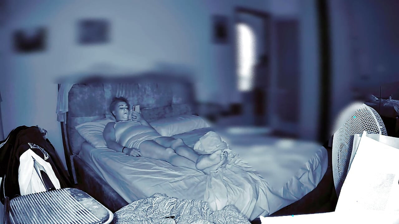 Wife Secretly Masturbates in the Room While Her Husband Is at Home and Watches Her