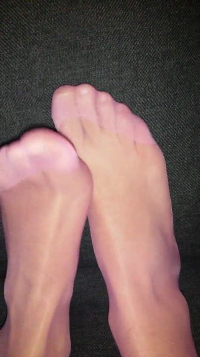 Pink nylonfeet relaxing
