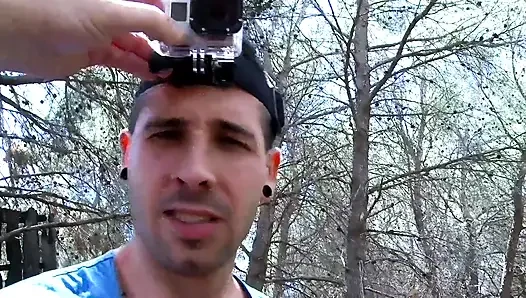 Young tattooed girl playing with bf in the woods