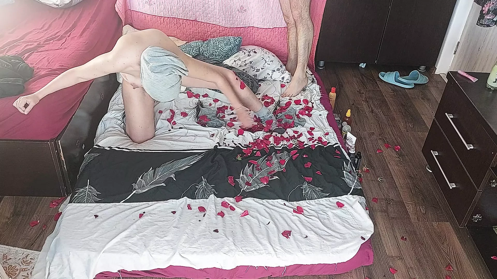 Foreplay in the bedroom with an amateur couple. Amateur MILF does yoga naked, hairy pussy, big ass, big tits.