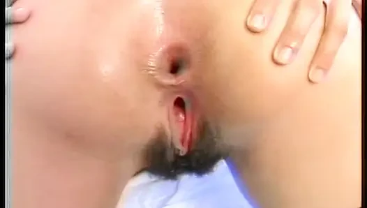 Two sexy brunettes toy each other's butt hole