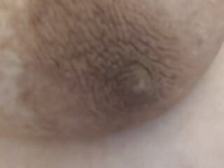 Small brown nipples, big areolas, big tits closeup
