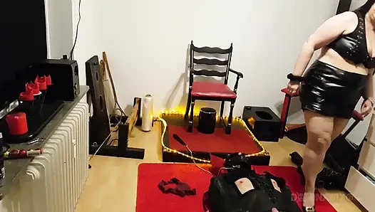 Curvy Brunette Dominatrix Commands Bound Slave in Fetish Dungeon