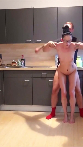 Powerful moment from "Skinny German Mom caught naked in kitchen and Seduced to Fuck"