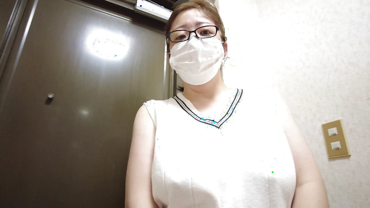 A Married Woman Masturbating in Front of the Door