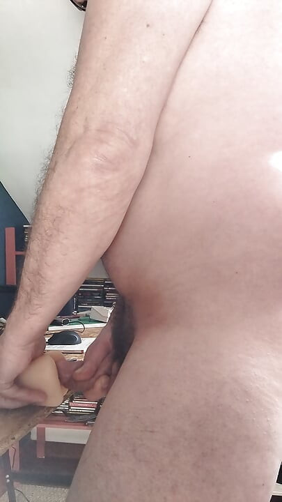 Inserting an anal toy and fucking a fake asshole