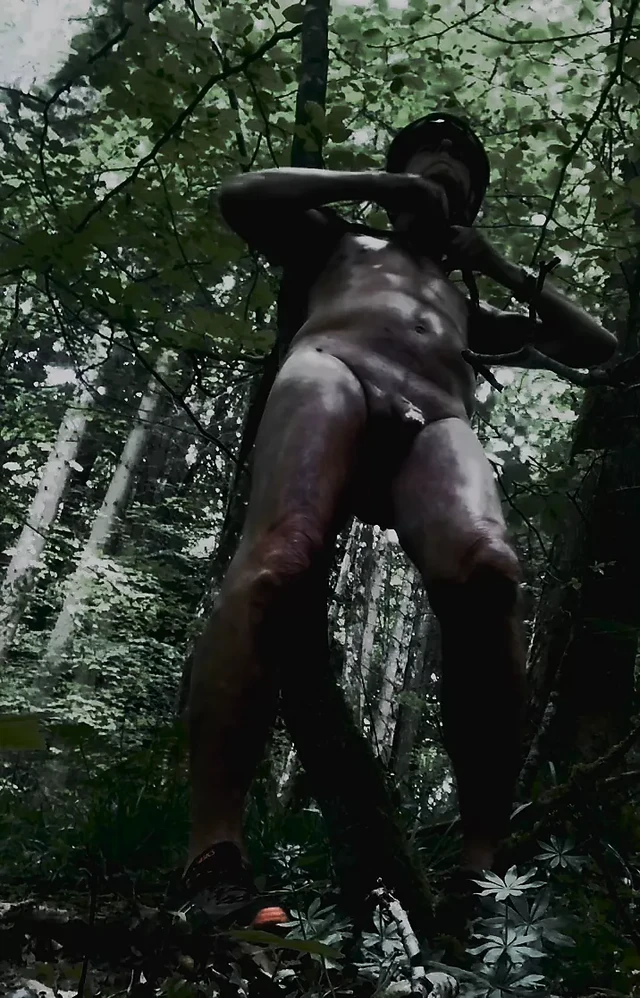 naked bound on a tree and oiled up