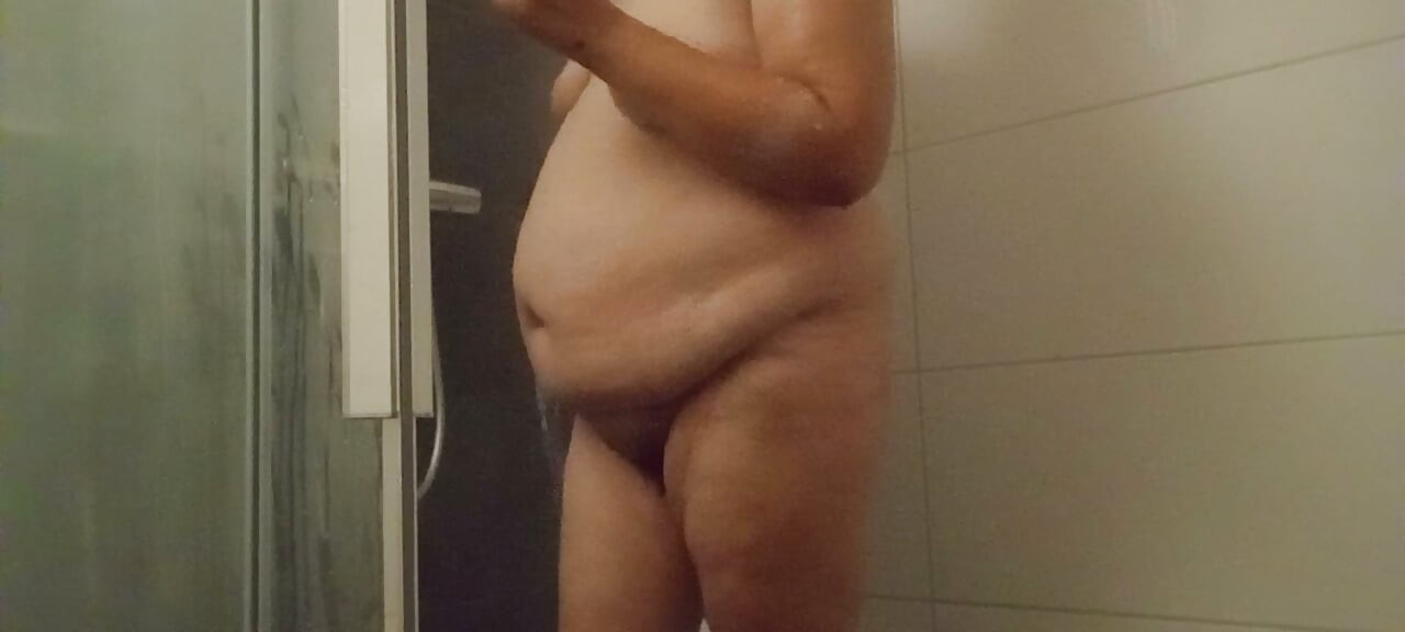 53 year old BBW showers her hairy pussy and big belly