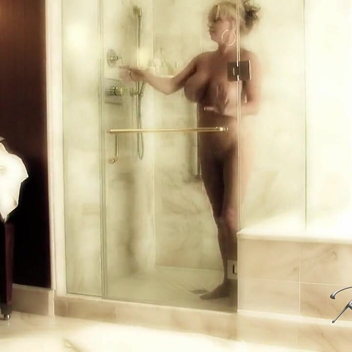 Rachel gets soaking wet in this shower tease