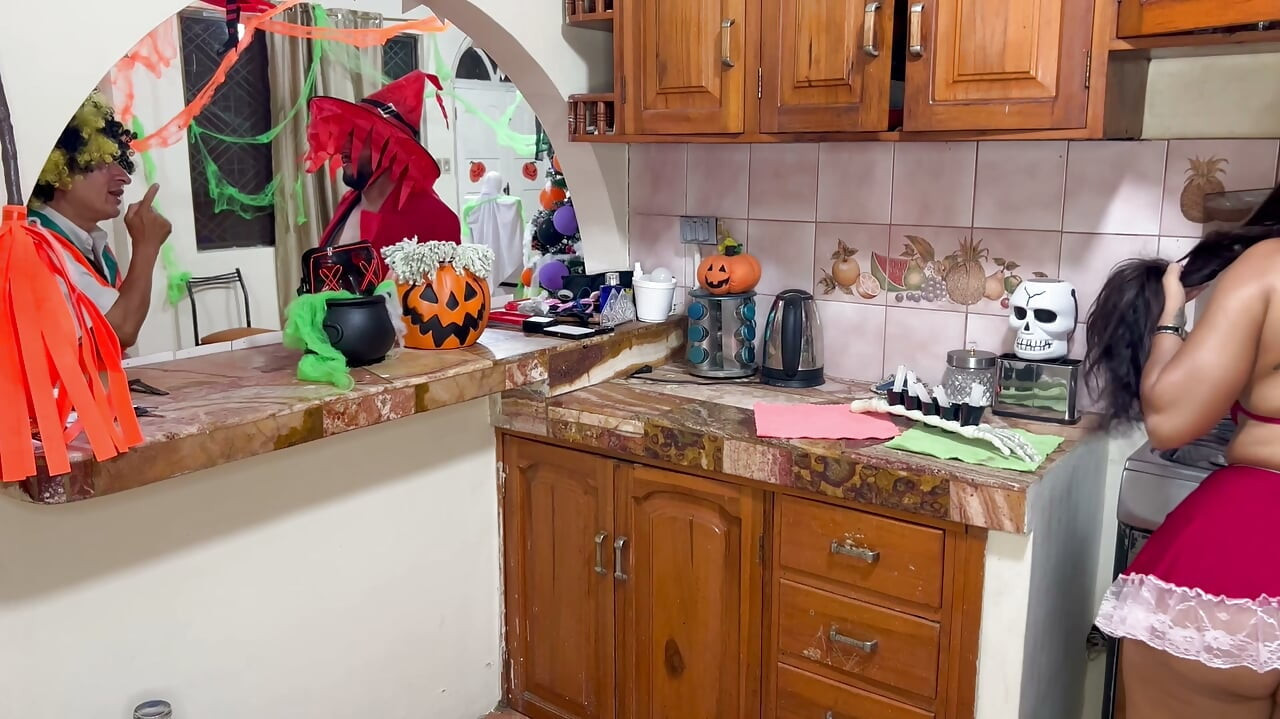 I celebrate Halloween with my stepdaughter while my husband watches television.