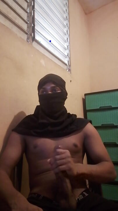 Masked big black cock masturbates