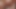Redhead ladyboy in colorful dress rides her lover's cock in