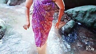 The Big Booty Desi Aunty swimming naked in the water and fucking in the water on an outdoor river