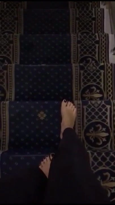 Barefoot on stairs