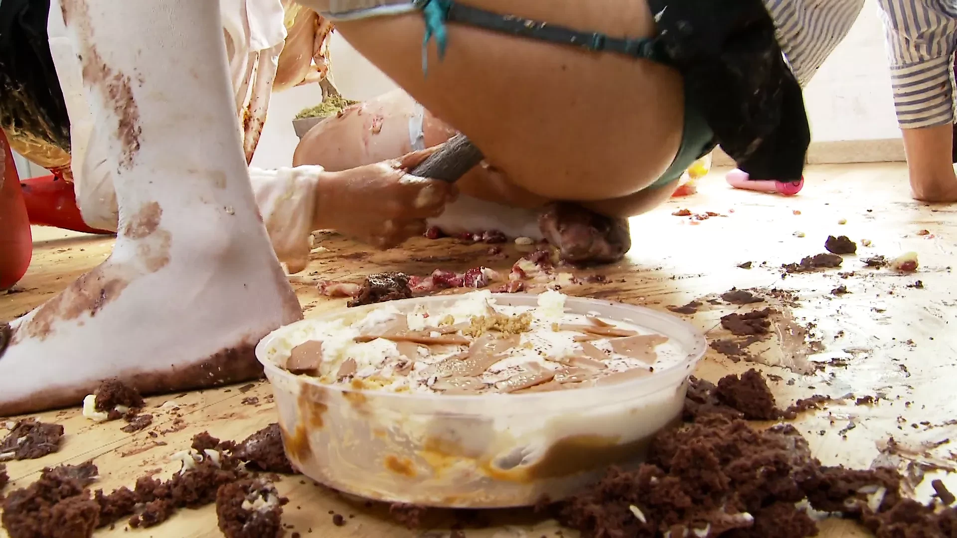 Brunette and redhead sluts with a food fetish fuck on the floor