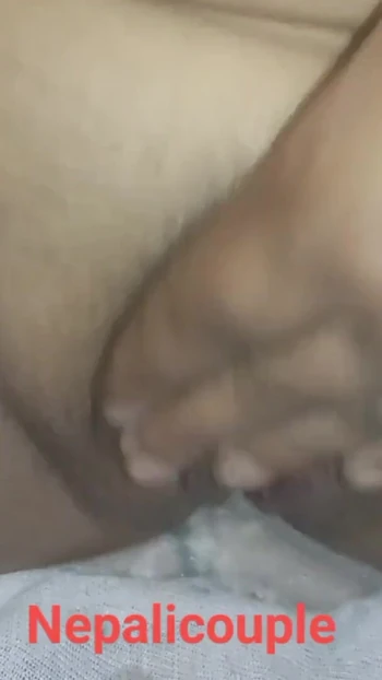 Key moment from "Nepali girl fingering pussy at home"