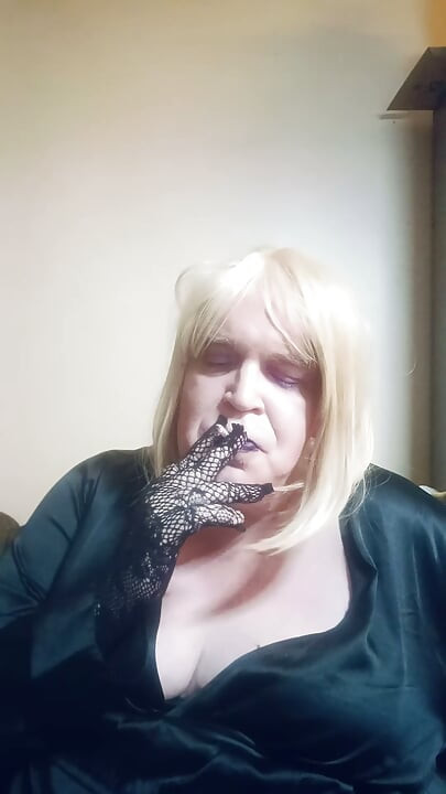 BBW TV smokes a superslim cigarette and tries on some gloves