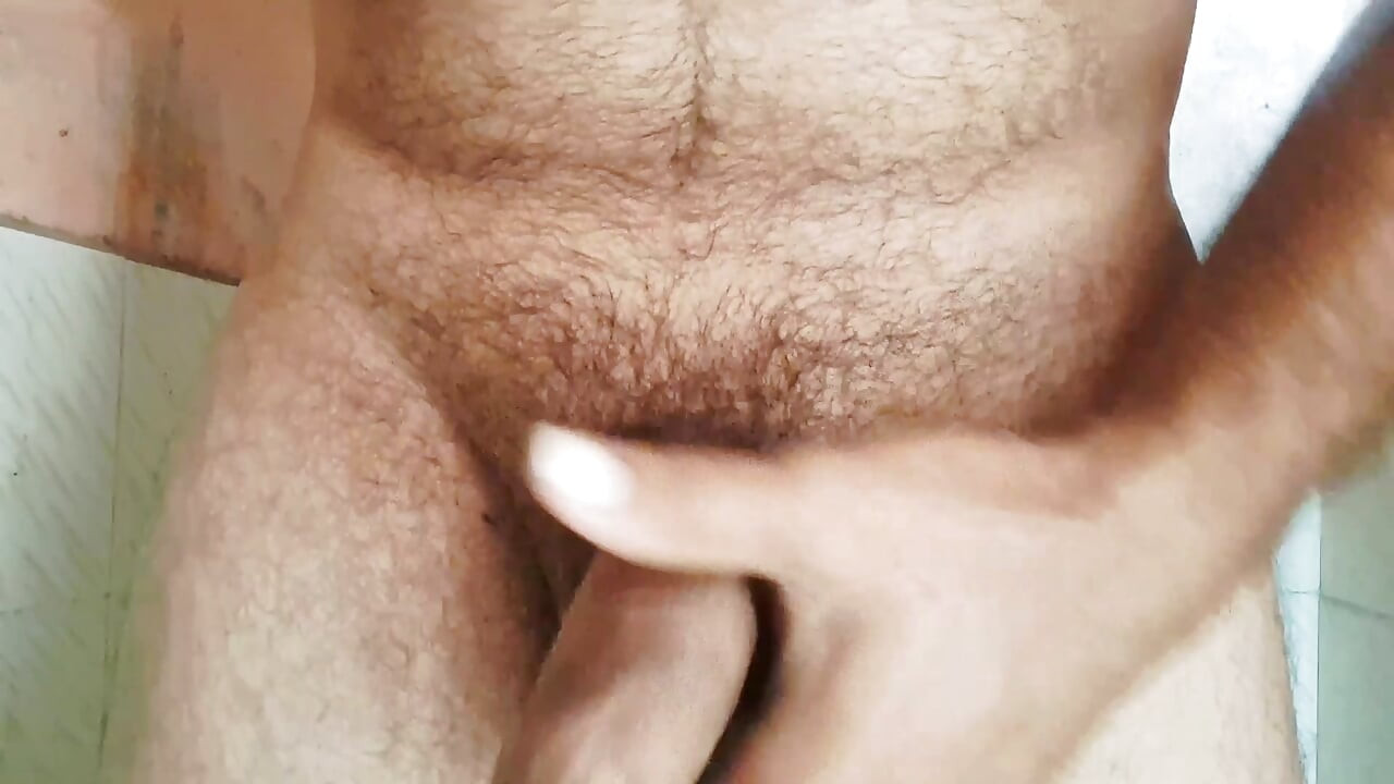 Marathi guy Jonny masturbating in bathroom with big cock