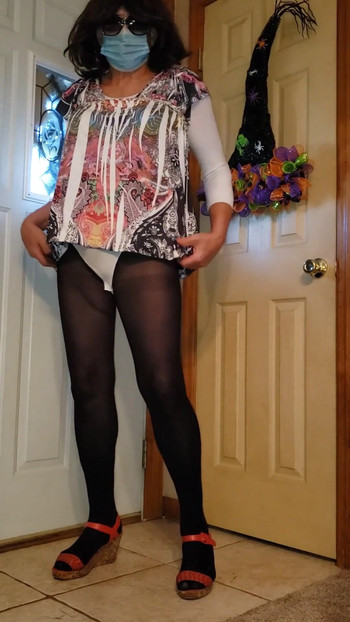 Memorable moment from "Crossdresser in my sexy new mini dress."