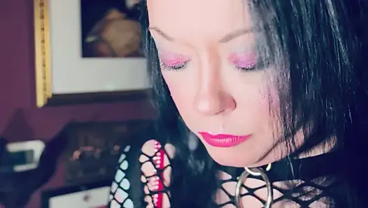 Pink & Delicious Tina Snua Sparks Up A Cigarette In A Holder