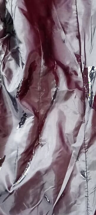 Ejaculating on the lining of her black leather coat