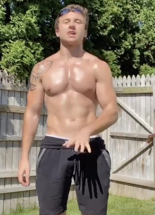 Sexy hot muscle guy dancing with huge bulge in shorts