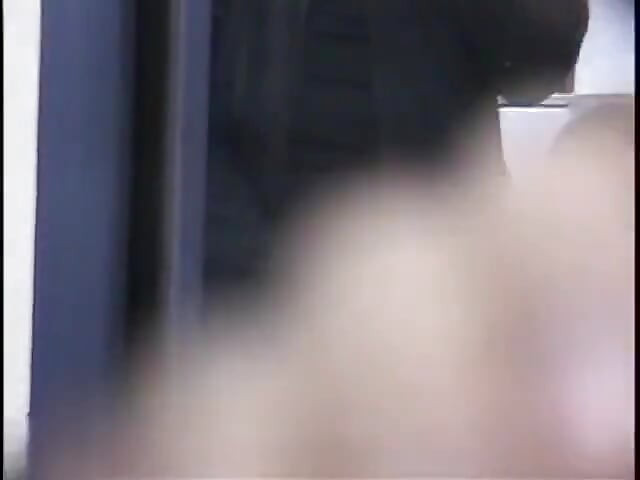 Guy is half naked and flexing for the camera