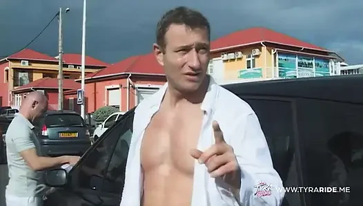 Blonde in Car During Nude Beach Film Shoot with Crew