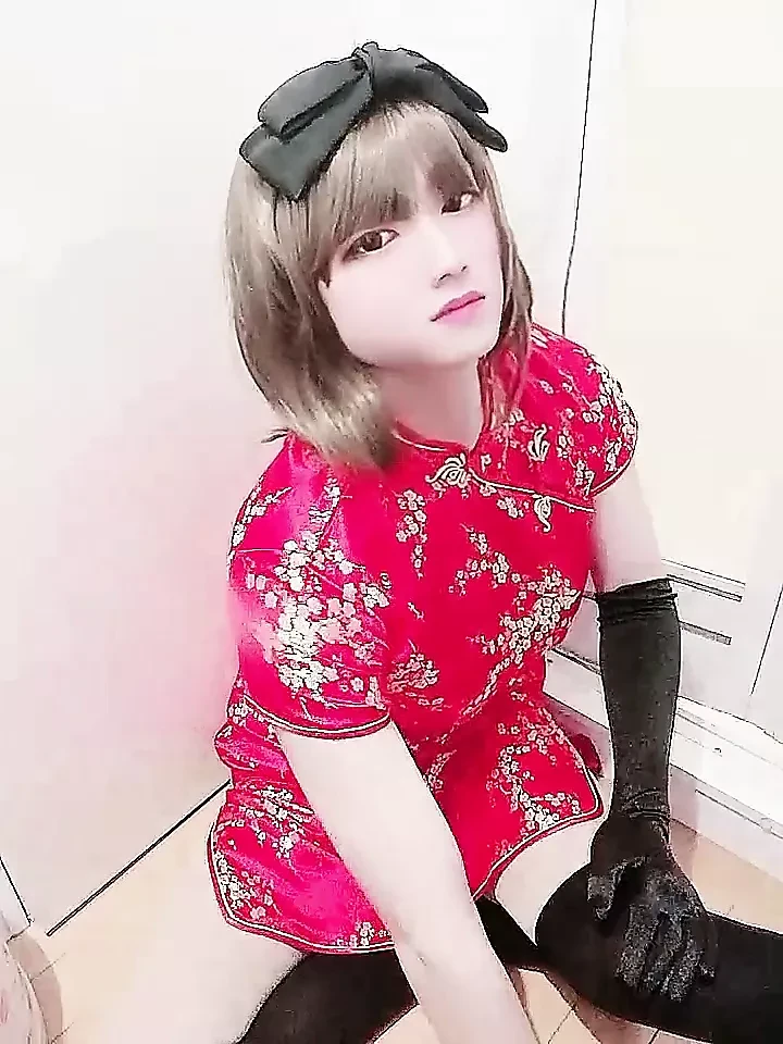 Japanese crossdresser Miya masturbates with Chinese red dress 8