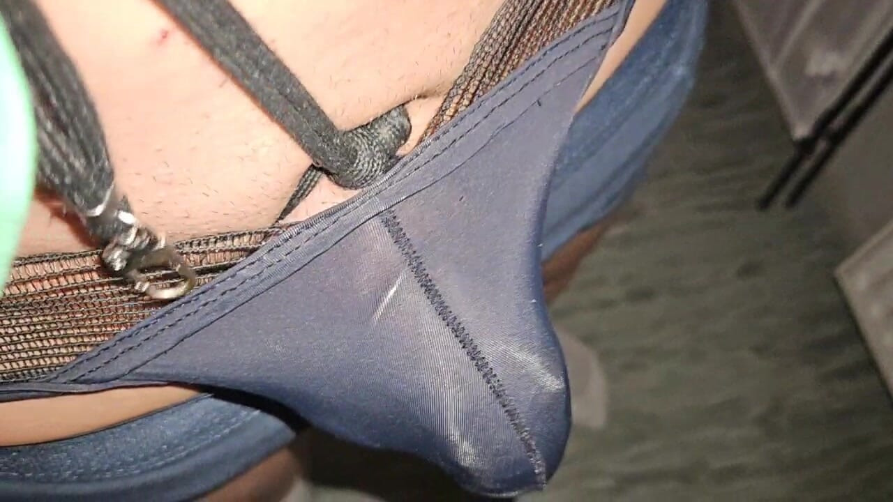 See-through thong reveals cock