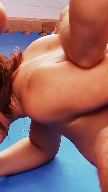 Emotional moment from "Mom and Teen have Anal 3Some Sex with the Coach at Yoga Session in Gym"